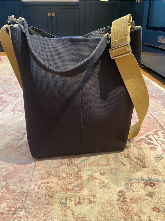 Rothy's Handbags - Rothy’s Black Canvas Bucket Bag with Adjustable Yellow Strap